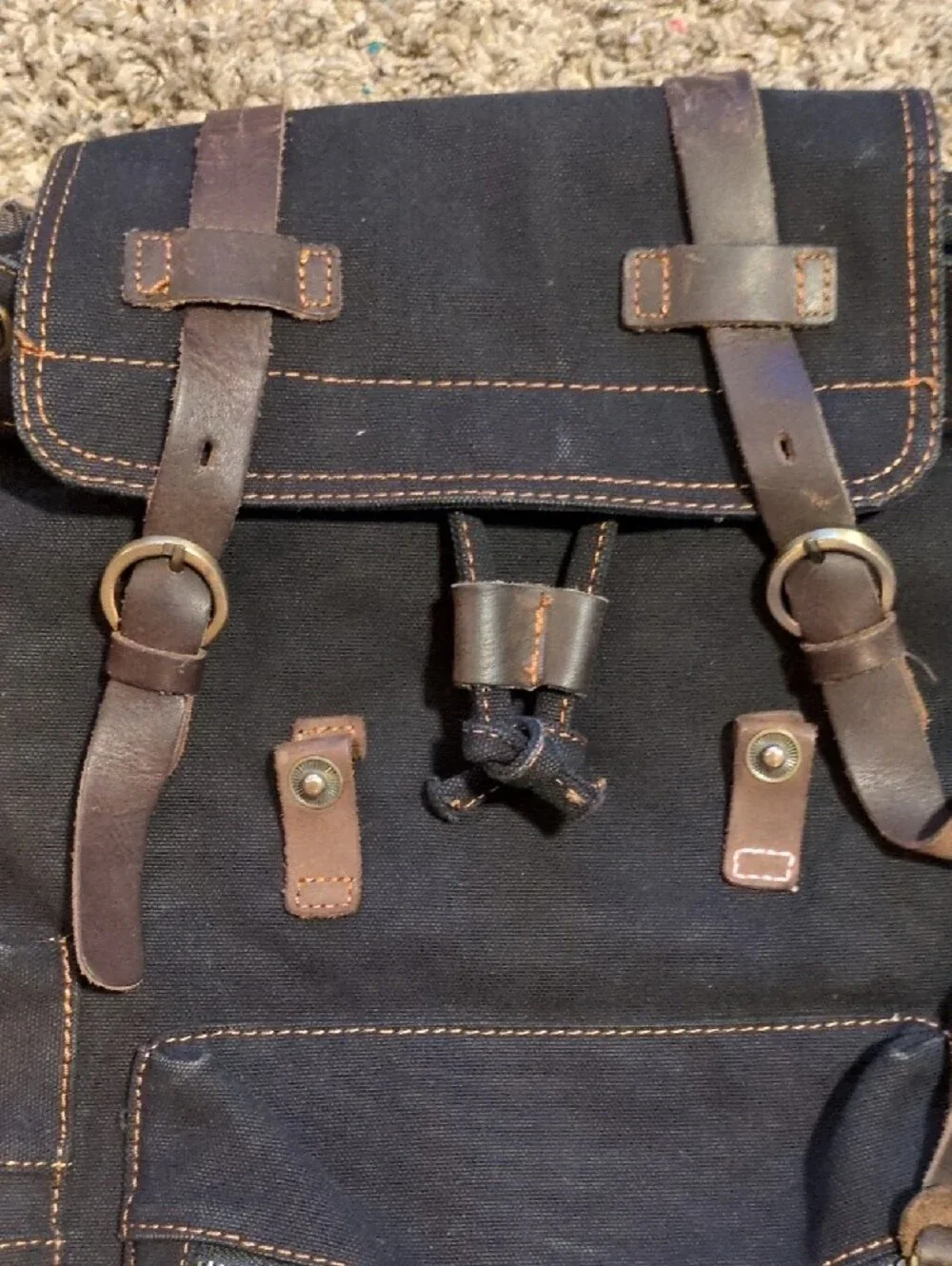 Classic Black Canvas Backpack with Brown Leather Accents